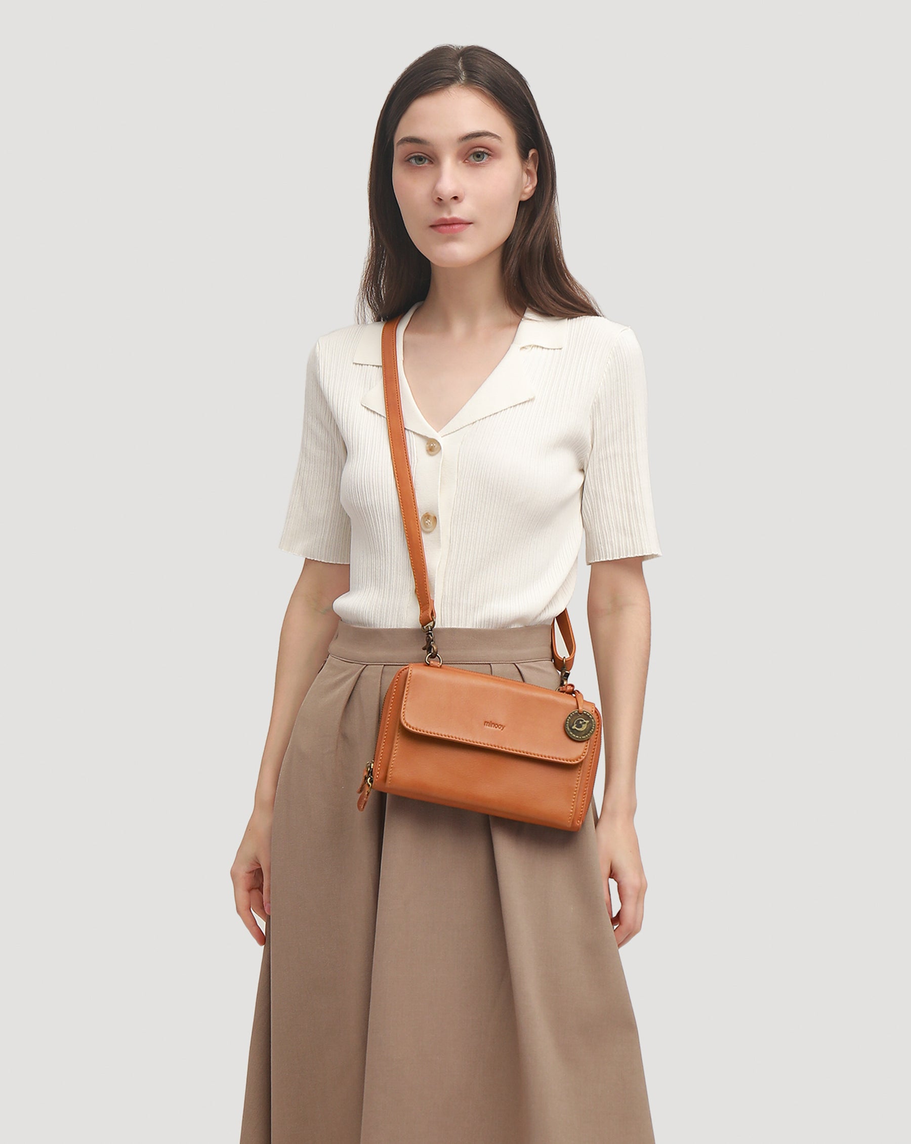 Euterpe Crossbody Bag.