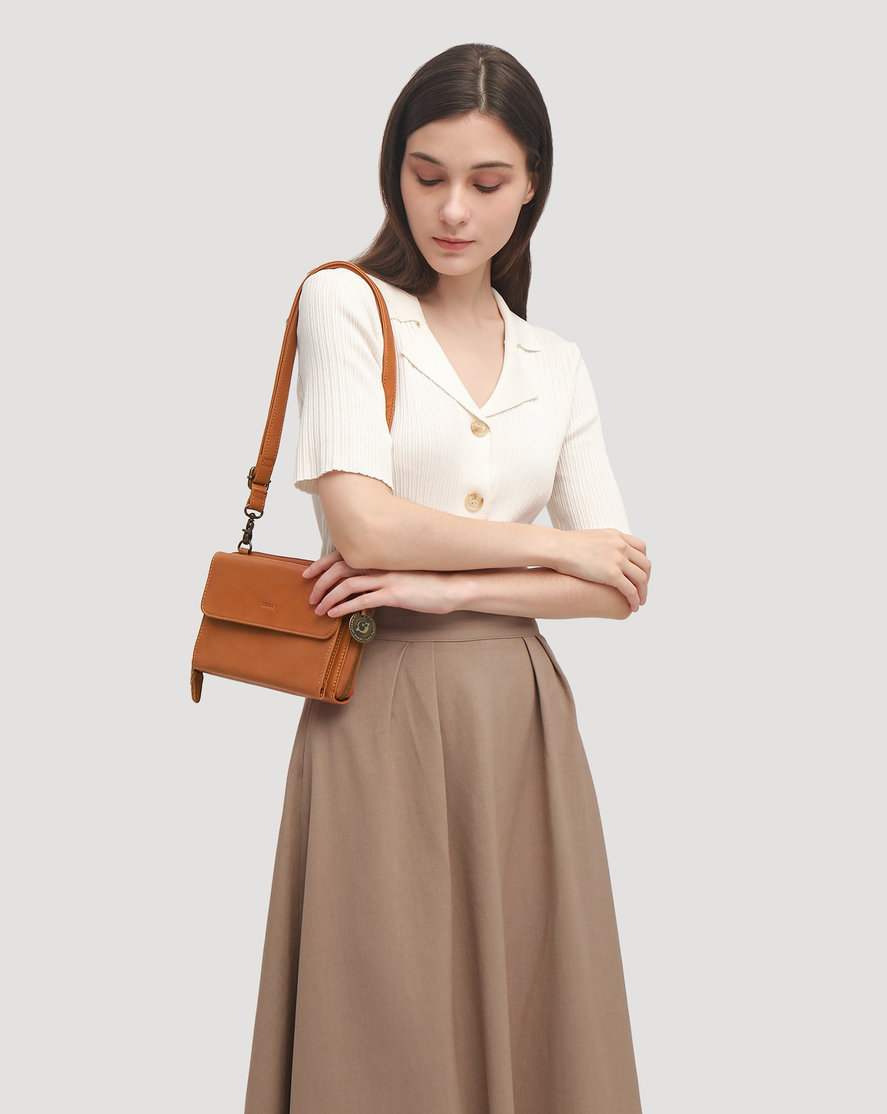 Euterpe Crossbody Bag.