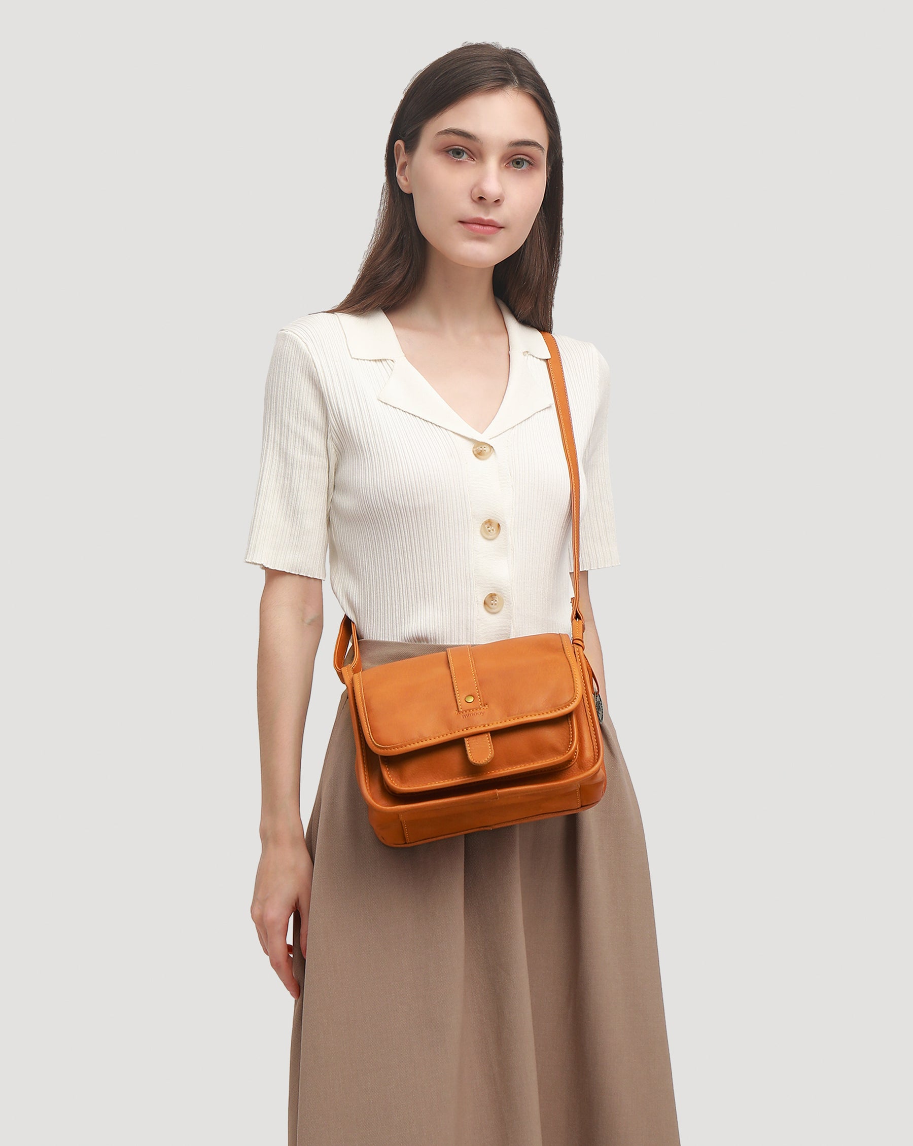 Mnemosyne Crossbody Bag.